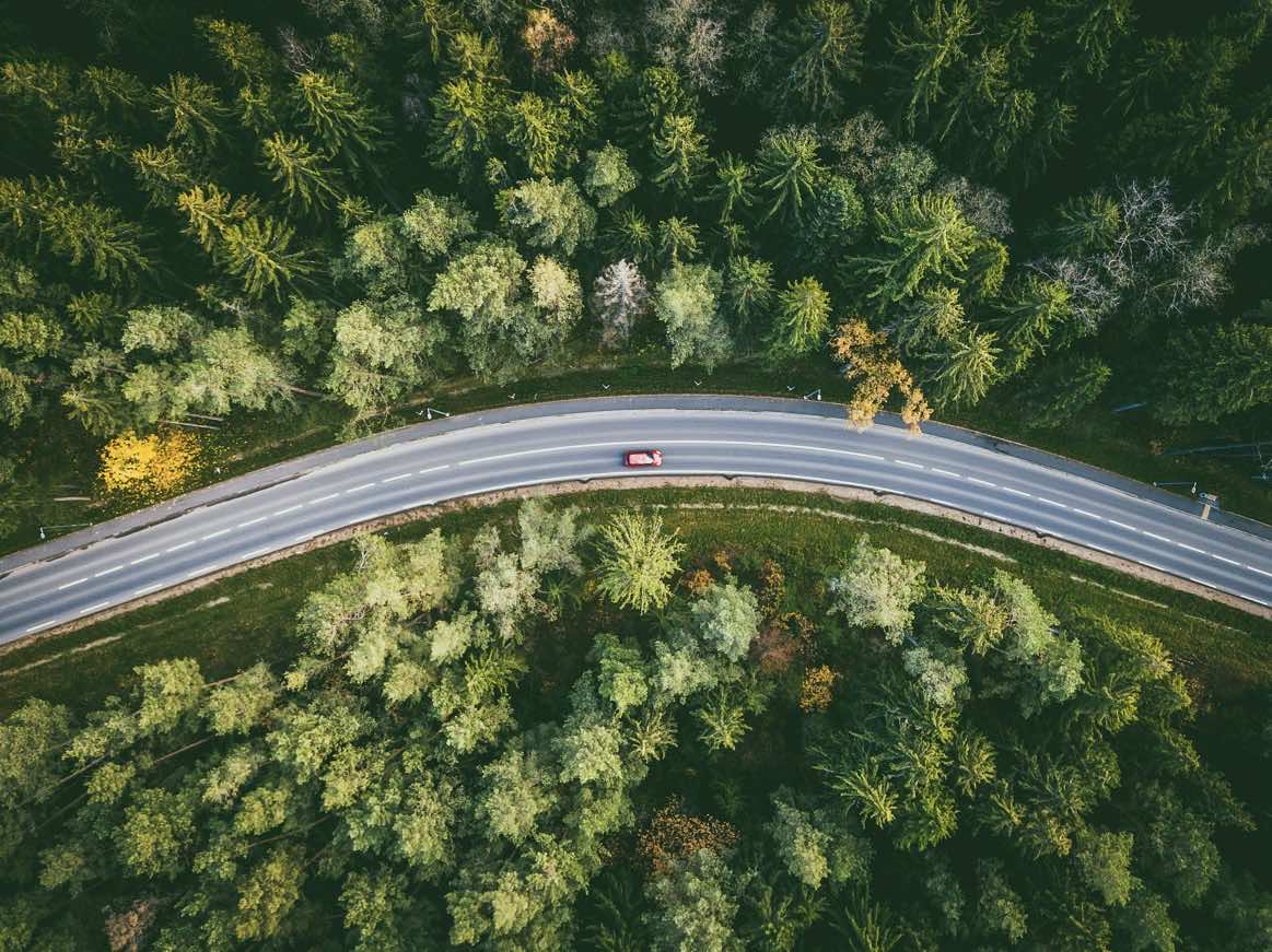 Car driving on winding road